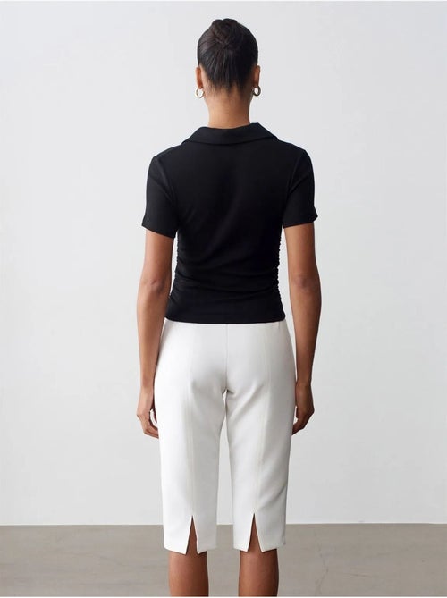 Shorts capri rectos de tiro alto con abertura - Kiabi Shorts capri rectos de tiro alto con abertura - Kiabi