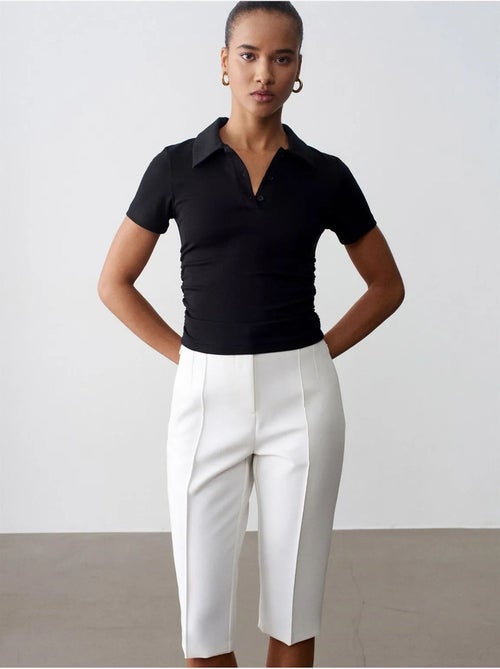 Shorts capri rectos de tiro alto con abertura - Kiabi Shorts capri rectos de tiro alto con abertura - Kiabi