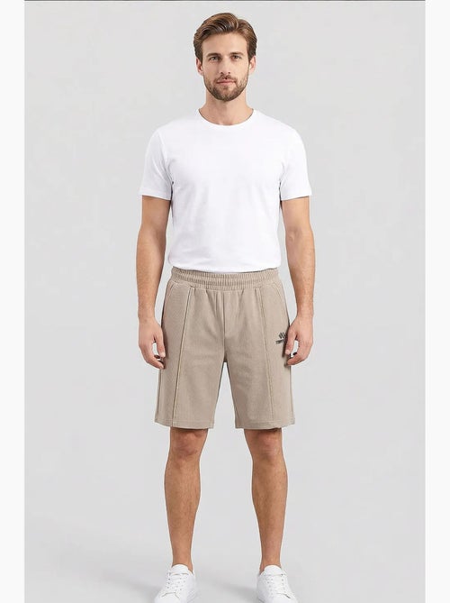 Shorts de hombre de algodón y poliéster tommy - Kiabi Shorts de hombre de algodón y poliéster tommy - Kiabi