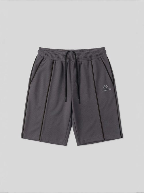 Shorts de hombre de algodón y poliéster tommy - Kiabi Shorts de hombre de algodón y poliéster tommy - Kiabi