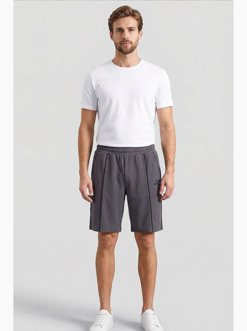 Shorts de hombre de algodón y poliéster tommy - Kiabi Shorts de hombre de algodón y poliéster tommy - Kiabi