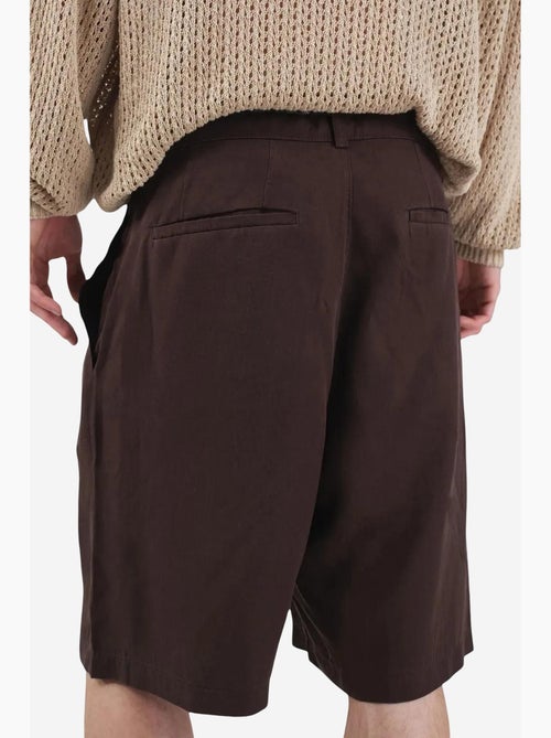 Shorts de tencel de tiro medio, pernera ancha y con cinturón giesto - Kiabi Shorts de tencel de tiro medio, pernera ancha y con cinturón giesto - Kiabi