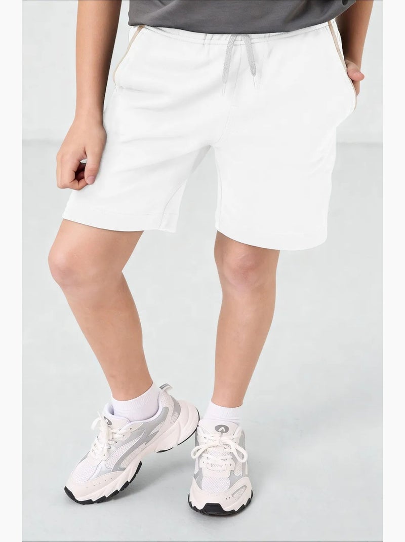 Shorts youth de mezcla de algodón tommy Blanco roto - Kiabi