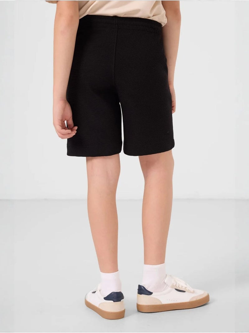 Shorts youth de mezcla de algodón tommy Negro - Kiabi