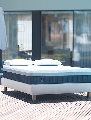 Somier tapizado de madera maciza beige con patas