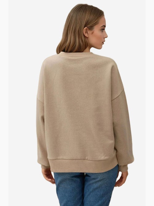 Sudadera básica de cuello redondo de gran tamaño hiccup - Kiabi Sudadera básica de cuello redondo de gran tamaño hiccup - Kiabi