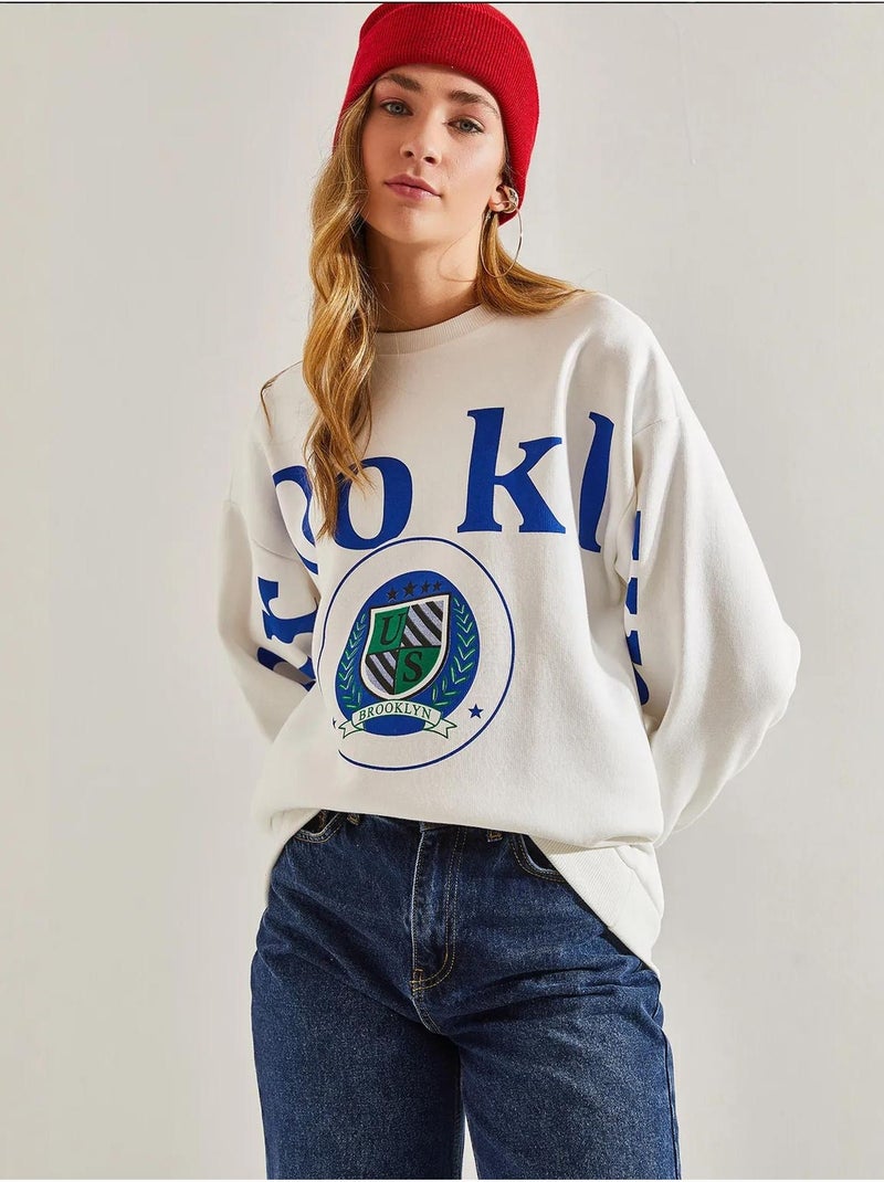 Sudadera cepillada de tres hilos con estampado lucci Blanco - Kiabi