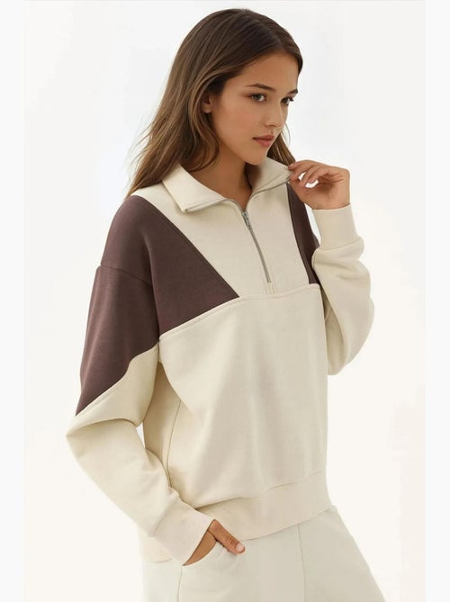 Sudadera cómoda con cuello con cremallera y textura hiccup - Kiabi Sudadera cómoda con cuello con cremallera y textura hiccup - Kiabi