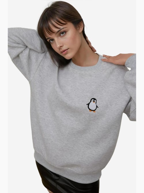 Sudadera cómoda de cuello redondo bordada con estampado animal hiccup - Kiabi Sudadera cómoda de cuello redondo bordada con estampado animal hiccup - Kiabi