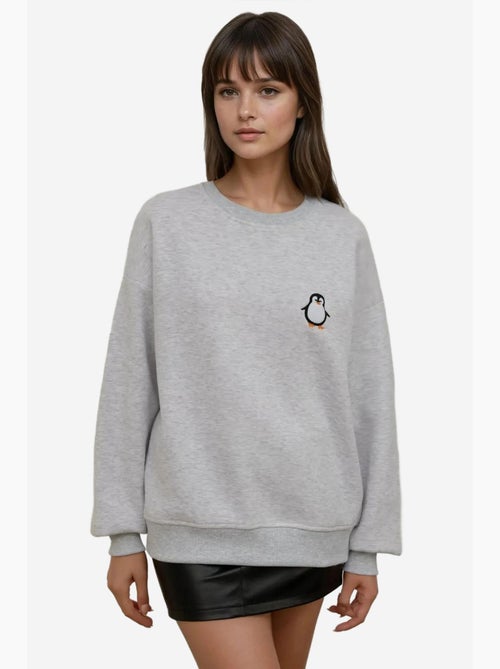 Sudadera cómoda de cuello redondo bordada con estampado animal hiccup - Kiabi Sudadera cómoda de cuello redondo bordada con estampado animal hiccup - Kiabi