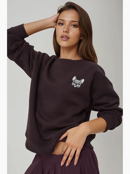 Sudadera cómoda de cuello redondo bordada con estampado animal hiccup - Kiabi Sudadera cómoda de cuello redondo bordada con estampado animal hiccup - Kiabi