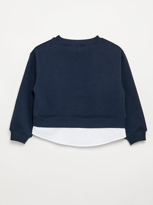 Sudadera con bajo de camisa integrado y bordado en el pecho - Kiabi