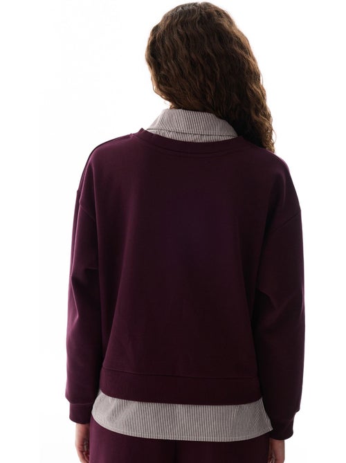 Sudadera con capa de camisa y cuello polo penti - Kiabi Sudadera con capa de camisa y cuello polo penti - Kiabi