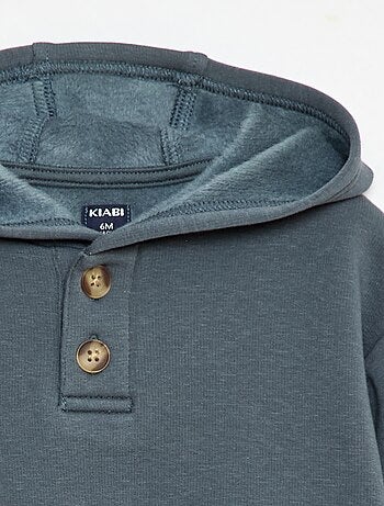 Sudadera con capucha, botones y forro cálido