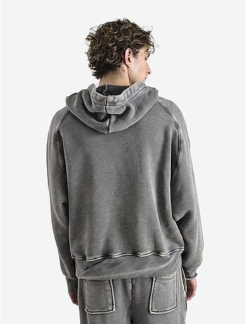 Sudadera con capucha extragrande y bolsillo giesto