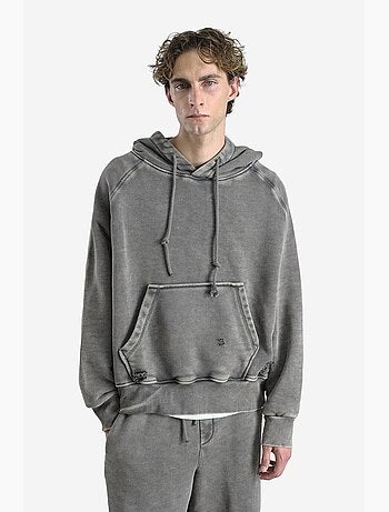 Sudadera con capucha extragrande y bolsillo giesto