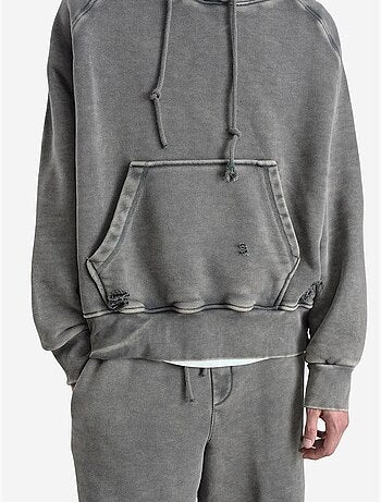 Sudadera con capucha extragrande y bolsillo giesto