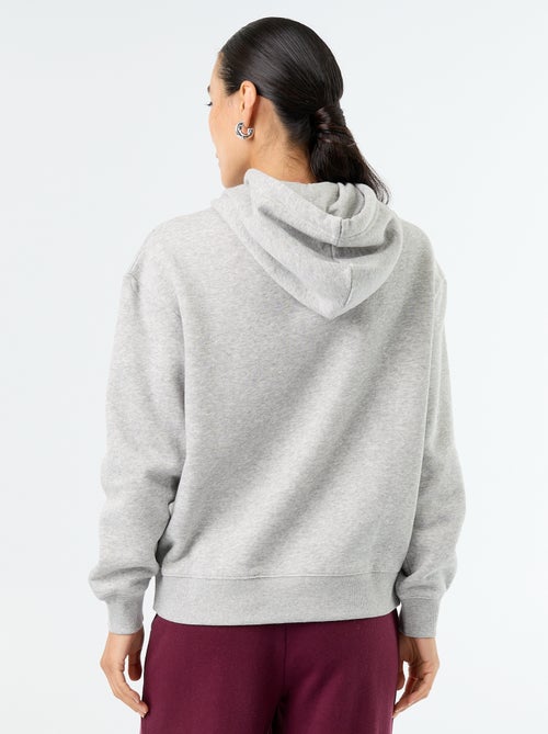 Sudadera con capucha lisa y bolsillo canguro - Kiabi Sudadera con capucha lisa y bolsillo canguro - Kiabi