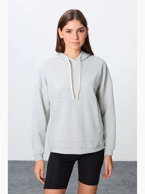 Sudadera con capucha oversize y bolsillo tommy - Kiabi Sudadera con capucha oversize y bolsillo tommy - Kiabi