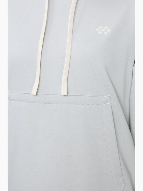 Sudadera con capucha oversize y bolsillo tommy - Kiabi Sudadera con capucha oversize y bolsillo tommy - Kiabi