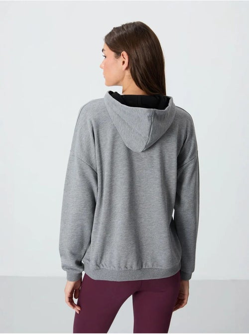 Sudadera con capucha oversize y bolsillo tommy - Kiabi