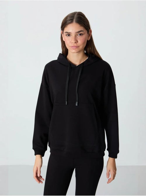 Sudadera con capucha oversize y bolsillo tommy - Kiabi Sudadera con capucha oversize y bolsillo tommy - Kiabi