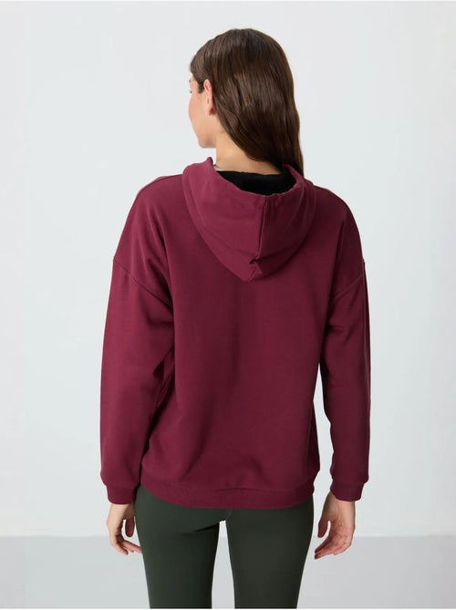 Sudadera con capucha oversize y bolsillo tommy - Kiabi Sudadera con capucha oversize y bolsillo tommy - Kiabi
