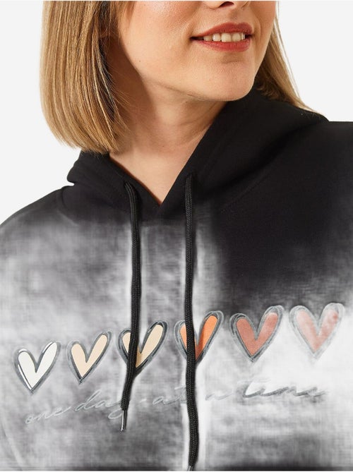 Sudadera con capucha y estampado de corazones cepillados de triple hilo lucci - Kiabi Sudadera con capucha y estampado de corazones cepillados de triple hilo lucci - Kiabi