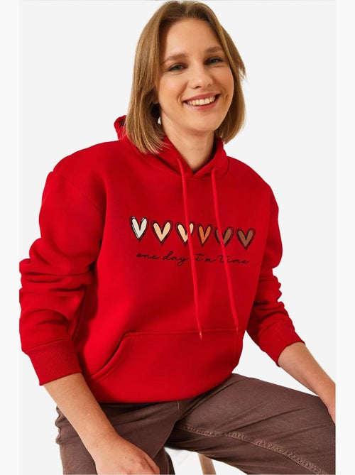 Sudadera con capucha y estampado de corazones cepillados de triple hilo lucci - Kiabi Sudadera con capucha y estampado de corazones cepillados de triple hilo lucci - Kiabi