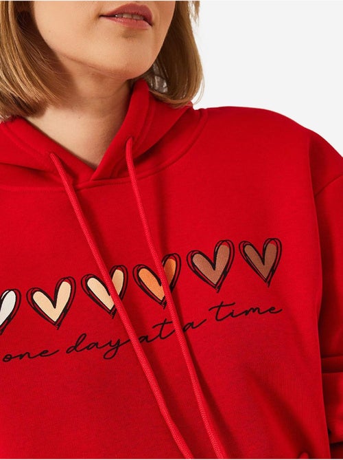 Sudadera con capucha y estampado de corazones cepillados de triple hilo lucci - Kiabi Sudadera con capucha y estampado de corazones cepillados de triple hilo lucci - Kiabi