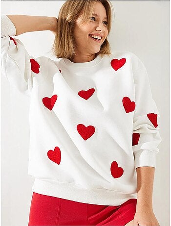 Sudadera con corazón bordado lucci