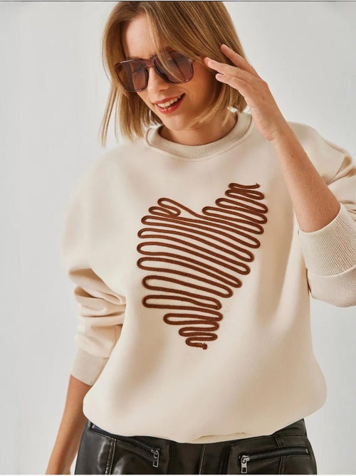 Sudadera con corazón bordado lucci - Kiabi Sudadera con corazón bordado lucci - Kiabi