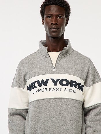 Sudadera con cremallera en el cuello alto