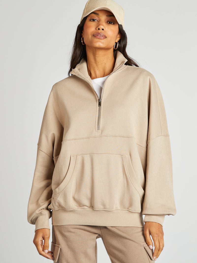 Sudadera con cremallera en el cuello y bolsillo tipo canguro beige - Kiabi