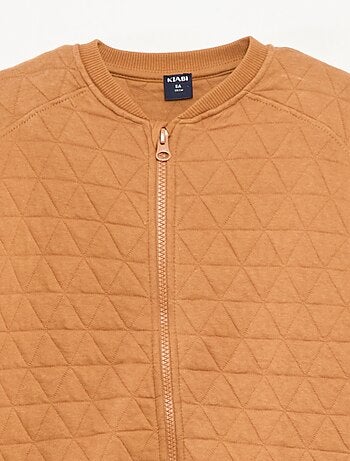 Sudadera con cremallera y acolchada de algodón liso