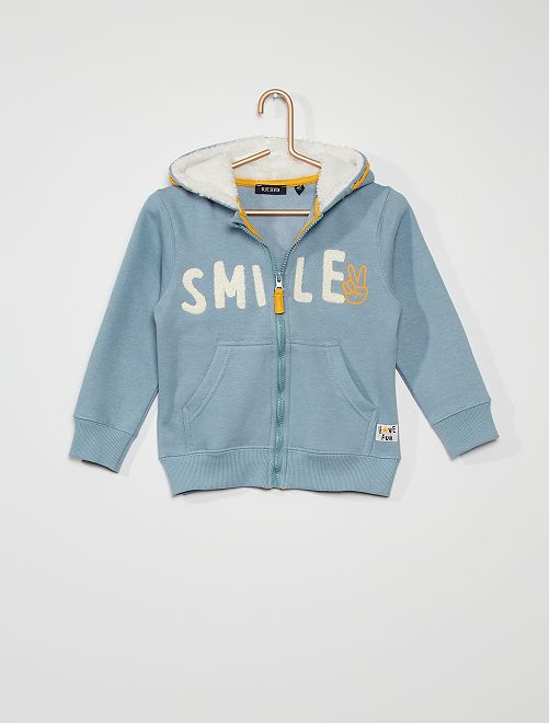 Sudadera azul cielo algodón orgánico con cremallera.