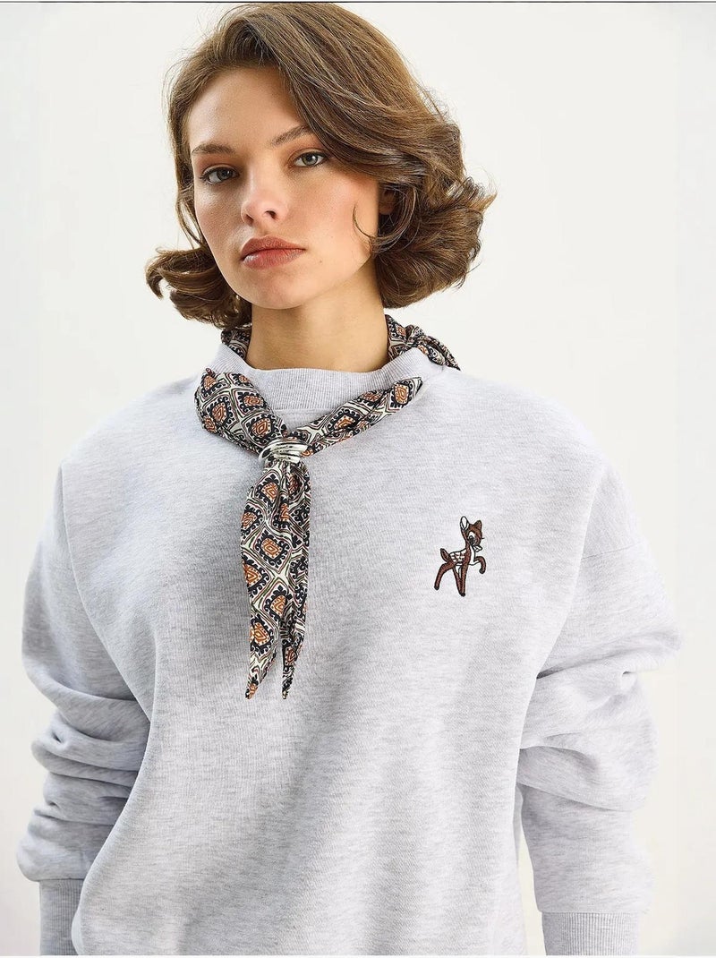 Sudadera con cuello redondo y bordado lucci Gris - Kiabi