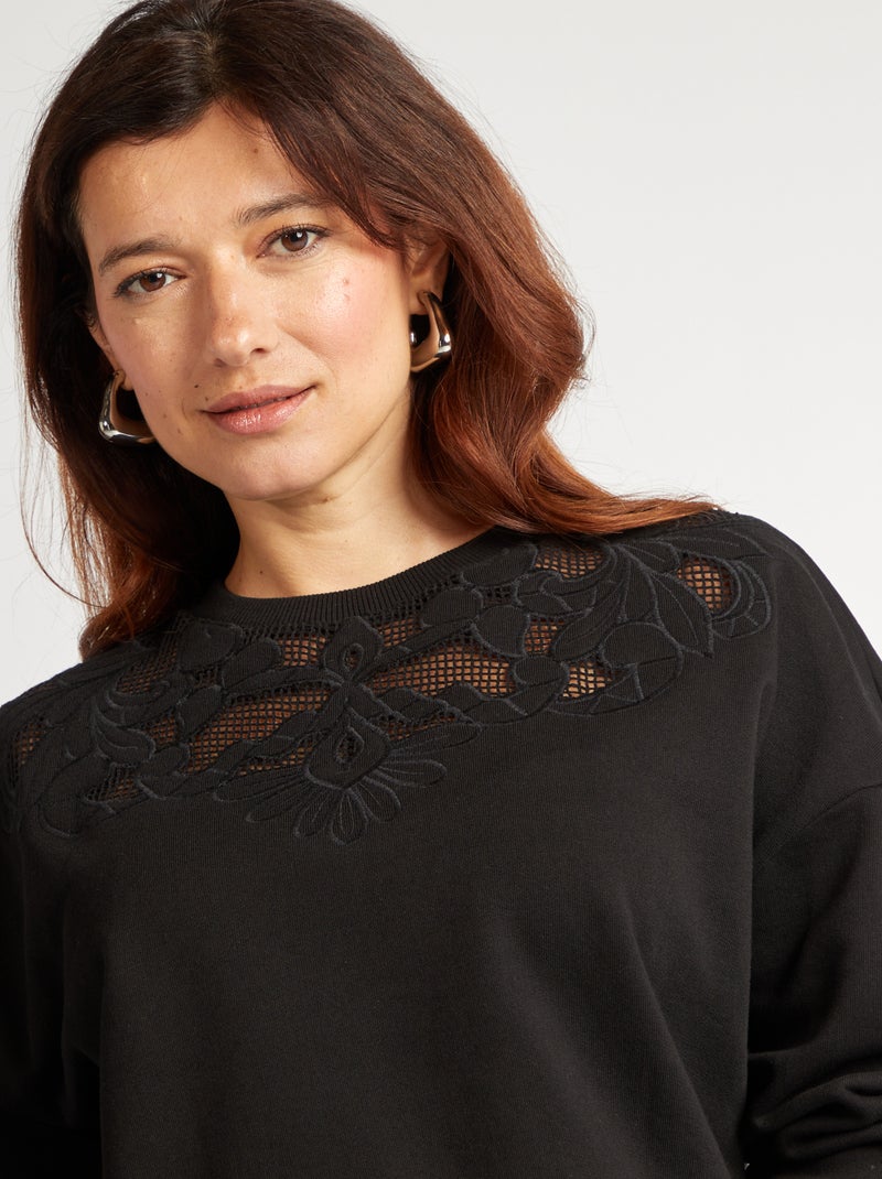 Sudadera con detalles calados negro - Kiabi