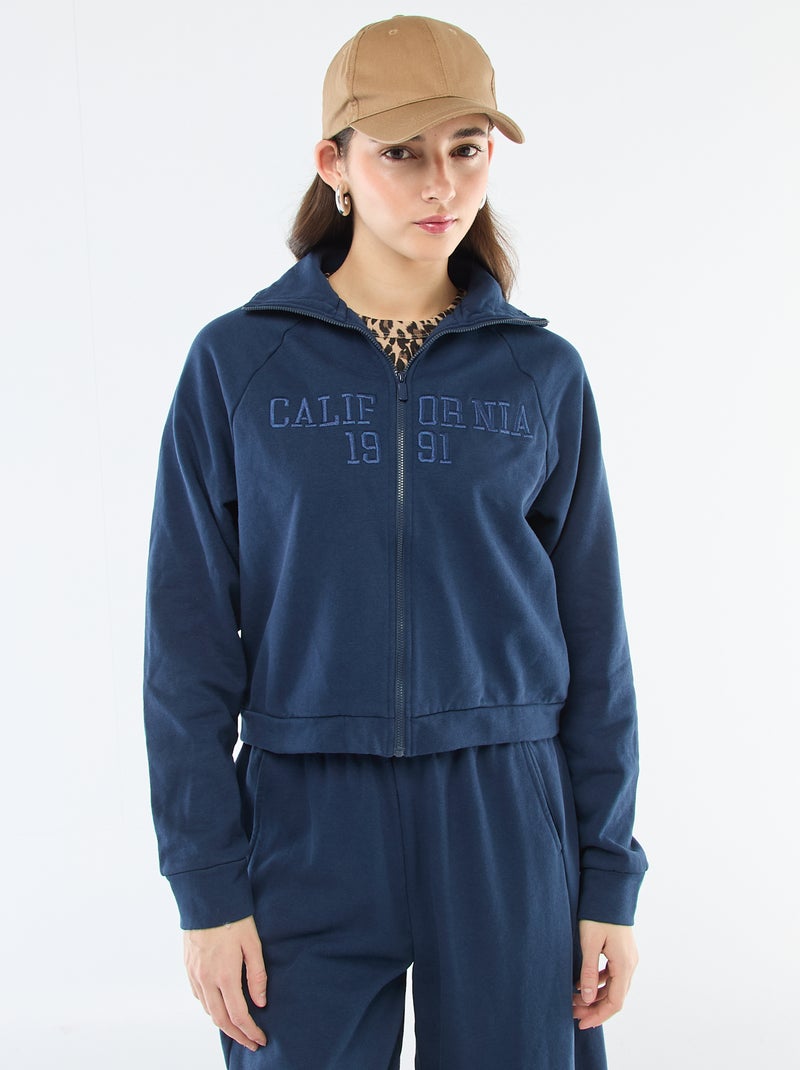 Sudadera corta con cremallera y mensaje bordado Azul - Kiabi