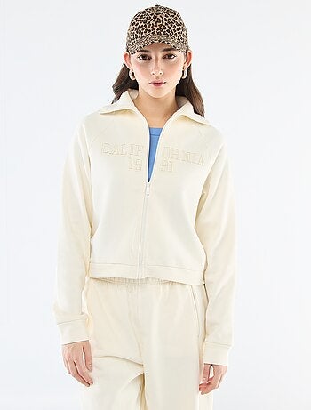 Sudadera corta con cremallera y mensaje bordado