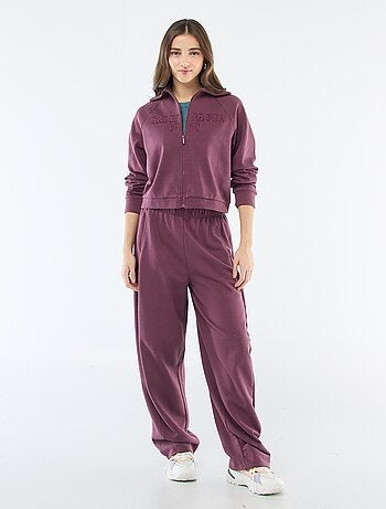 Sudadera corta con cremallera y mensaje bordado