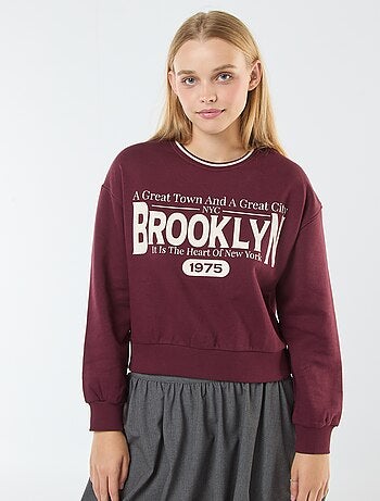 Sudadera corta con inscripción americana