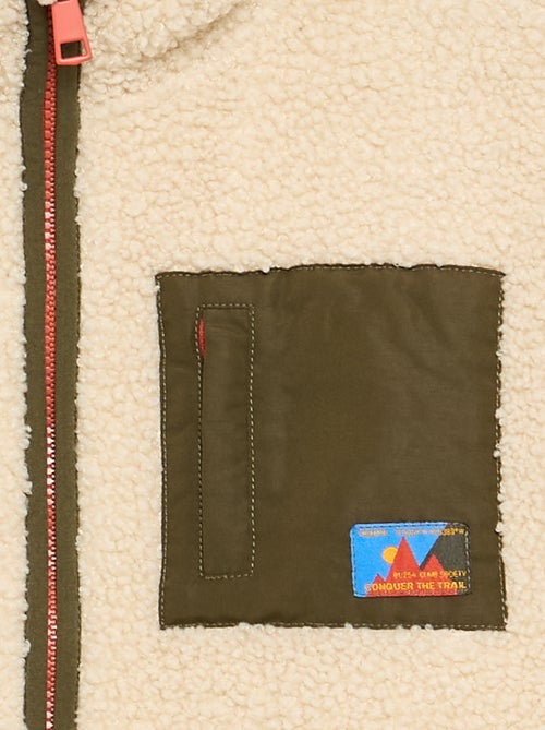 Sudadera de borreguito con cremallera y cuello alto - Kiabi Sudadera de borreguito con cremallera y cuello alto - Kiabi