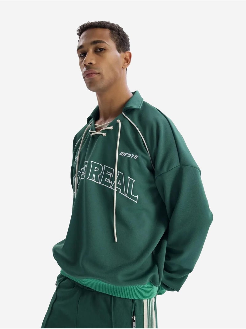 Sudadera de cuello abierto con estampado de texto y detalle de lazo giesto Verde oscuro - Kiabi