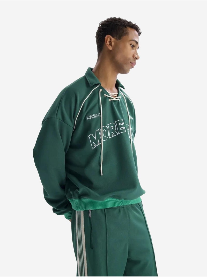 Sudadera de cuello abierto con estampado de texto y detalle de lazo giesto Verde oscuro - Kiabi