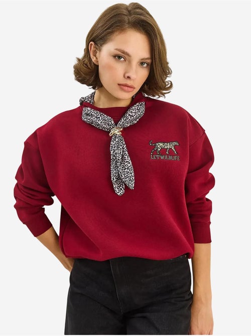 Sudadera de cuello redondo bordada con estampado de leopardo de lucci - Kiabi Sudadera de cuello redondo bordada con estampado de leopardo de lucci - Kiabi