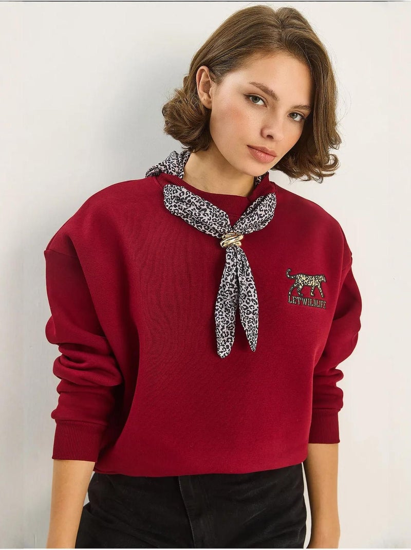 Sudadera de cuello redondo bordada con estampado de leopardo de lucci Rojo burdeos - Kiabi