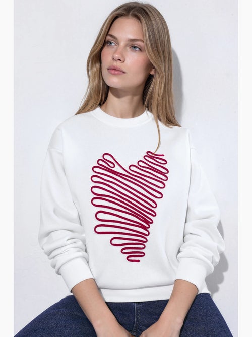 Sudadera de cuello redondo con bordado de corazón hiccup - Kiabi Sudadera de cuello redondo con bordado de corazón hiccup - Kiabi
