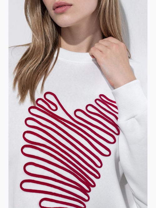 Sudadera de cuello redondo con bordado de corazón hiccup - Kiabi Sudadera de cuello redondo con bordado de corazón hiccup - Kiabi