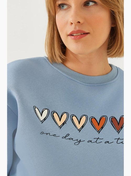 Sudadera de cuello redondo con estampado de corazón lucci - Kiabi